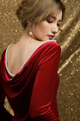 Velvet midi dress with draped cowl back and pearl trim for timeless evening elegance